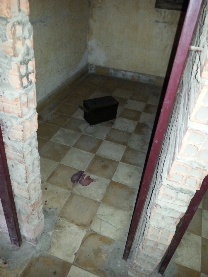Blood stains still evident on the floor of a cell